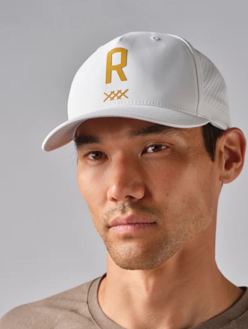 White Baseball Cap with Gold 'R' Logo